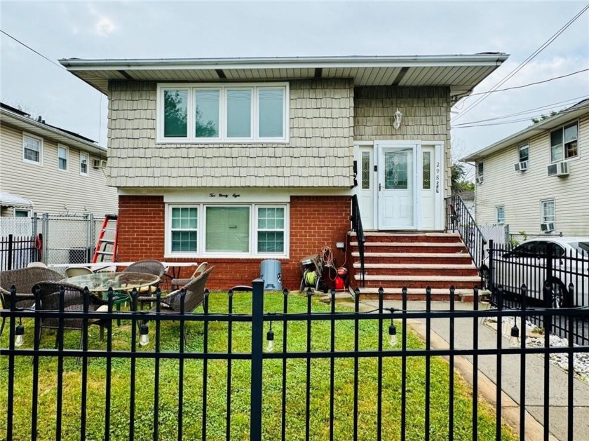 Welcome to this well-maintained 2 family detached High Ranch - Beach Home for sale in Staten  Island, New York on Beachhouse.com