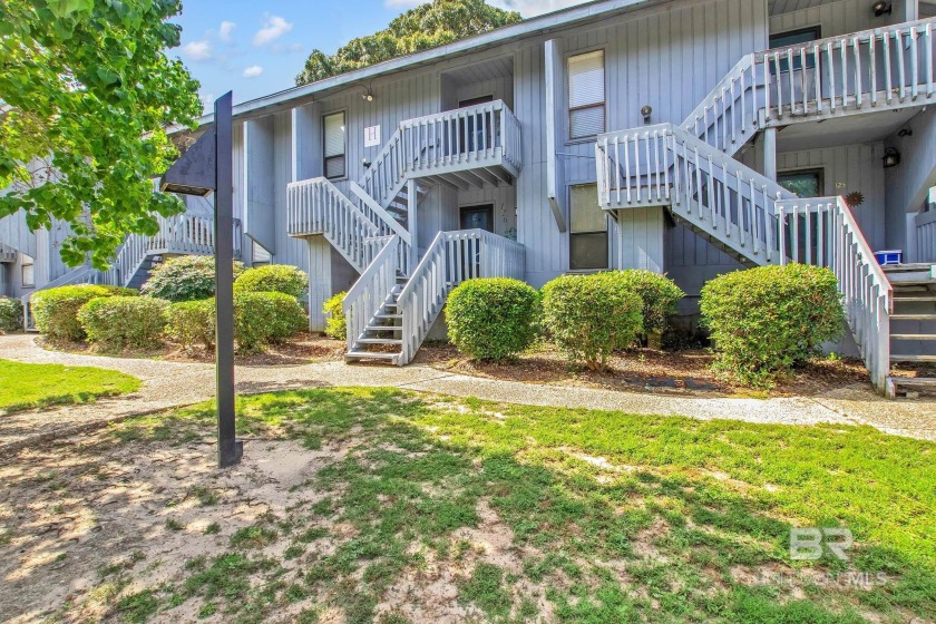 Set along the 18th fairway of Lake Forest Golf Club, this - Beach Condo for sale in Daphne, Alabama on Beachhouse.com