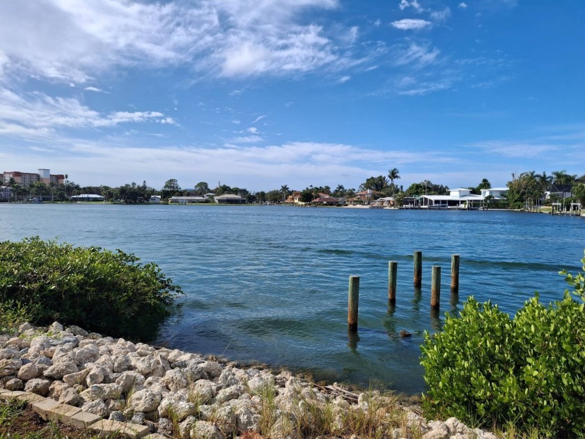 LOCATION, LOCATION.  Directly on the water of Roberts Bay. Relax - Beach Home for sale in Venice, Florida on Beachhouse.com