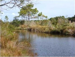 PRETTY VIEW OF THE BAYOU AND MARSH. COUNTY ZONING R-4 ALLOWS - Beach Lot for sale in Ocean Springs, Mississippi on Beachhouse.com