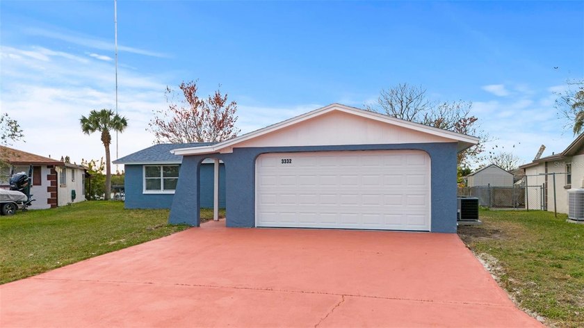 UPDATED HOME WITH 3BR/2BATH/4TH BEDROOM OR BONUS ROOM AND A - Beach Home for sale in Holiday, Florida on Beachhouse.com