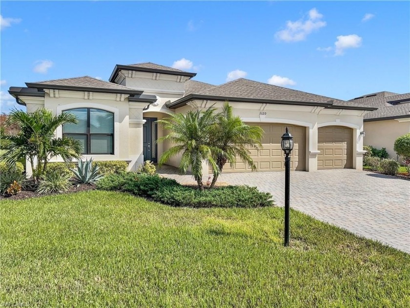 DEAL ALERT!! GORGEOUS LAKE VIEW HOME W/3-CAR GARAGE + MORE THAN - Beach Home for sale in Fort Myers, Florida on Beachhouse.com