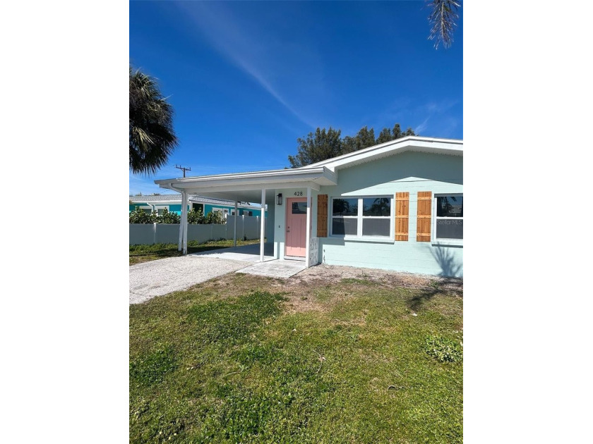 Discover coastal living at its finest in this inviting - Beach Townhome/Townhouse for sale in Holmes Beach, Florida on Beachhouse.com