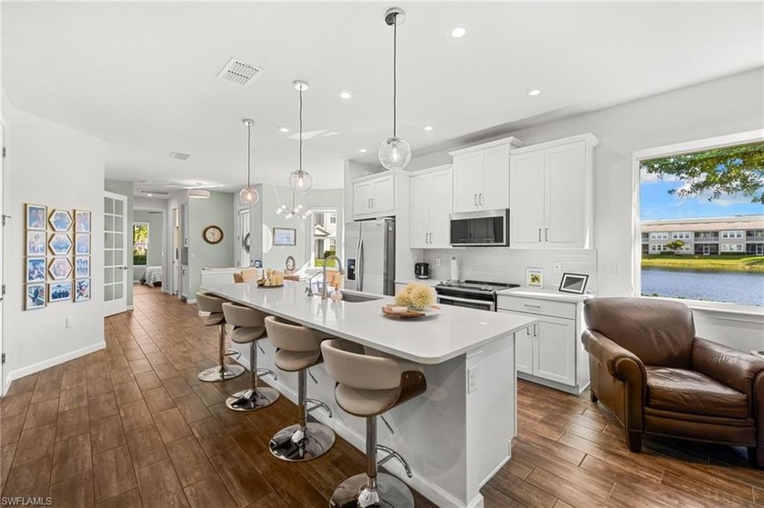 Highly sought-after and rarely available lake-view, turnkey end - Beach Home for sale in Naples, Florida on Beachhouse.com