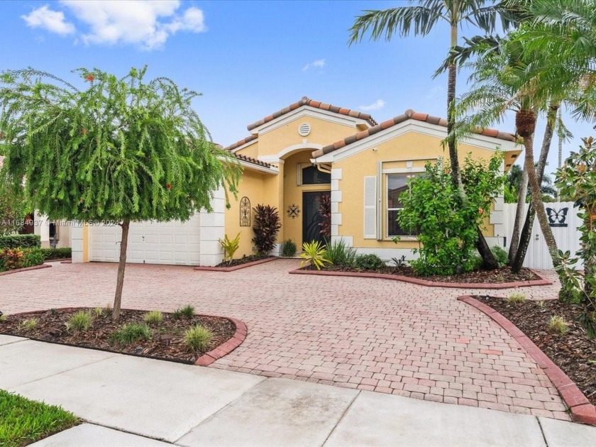 WELCOME TO THIS METICULOUSLY MAINTAINED WATERFRONT HOME, LOCATED - Beach Home for sale in Miramar, Florida on Beachhouse.com