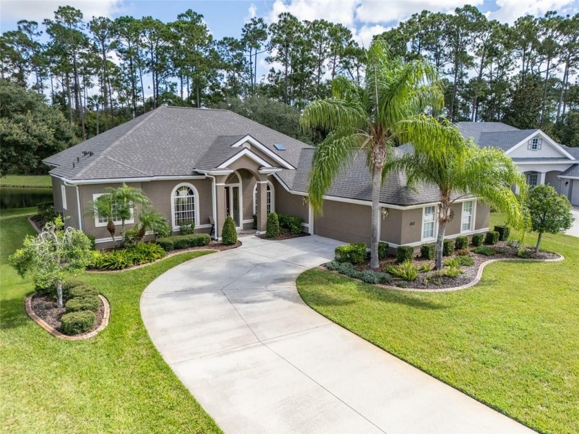 Enjoy Florida living with Palm trees & nature views. The quiet - Beach Home for sale in Ormond Beach, Florida on Beachhouse.com