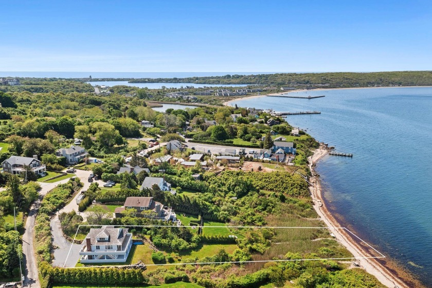 Tucked away on the shores of Fort Pond Bay, this well-kept 2,500 - Beach Home for sale in Montauk, New York on Beachhouse.com