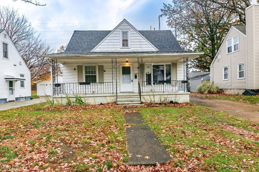 Opportunity awaits at this classic Lorain bungalow! Nestled - Beach Home for sale in Lorain, Ohio on Beachhouse.com