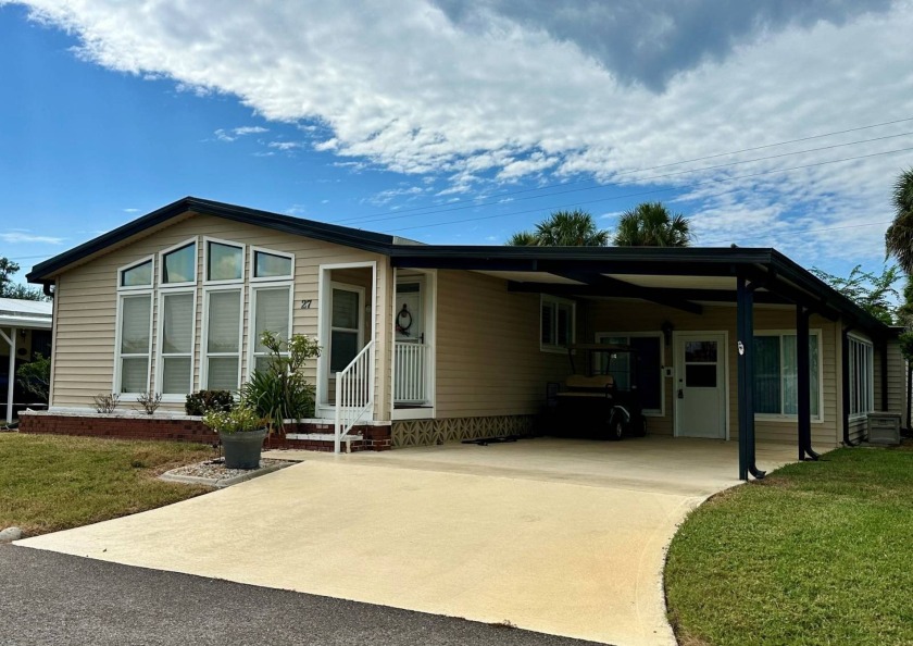 Step into this bright and inviting home where cathedral ceilings - Beach Home for sale in Nokomis, Florida on Beachhouse.com