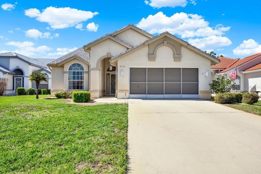 Welcome to the highly sought-after guard-gated Glen Lakes Golf & - Beach Home for sale in Weeki Wachee, Florida on Beachhouse.com