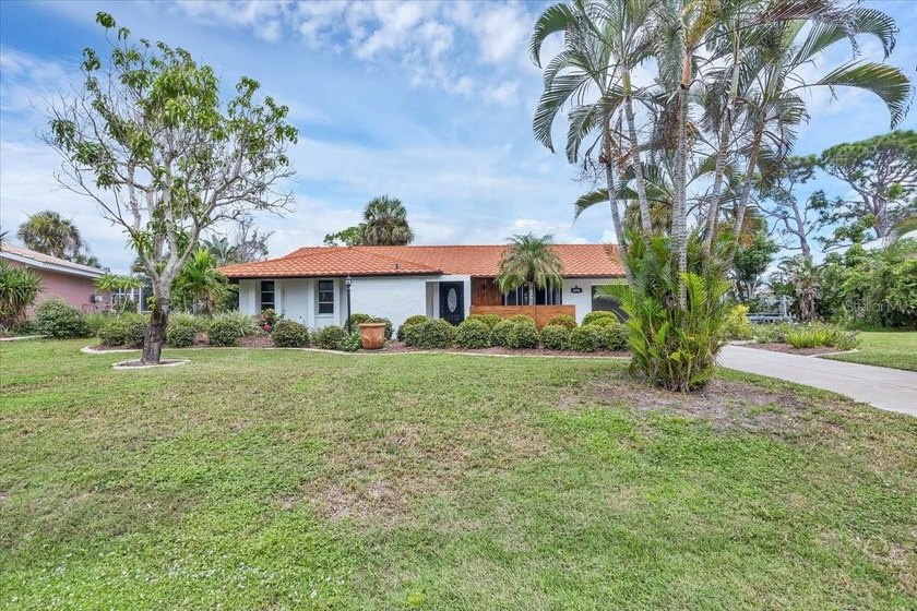 Nestled on a desireable saltwater canal on the Coral Ceek - Beach Home for sale in Placida, Florida on Beachhouse.com