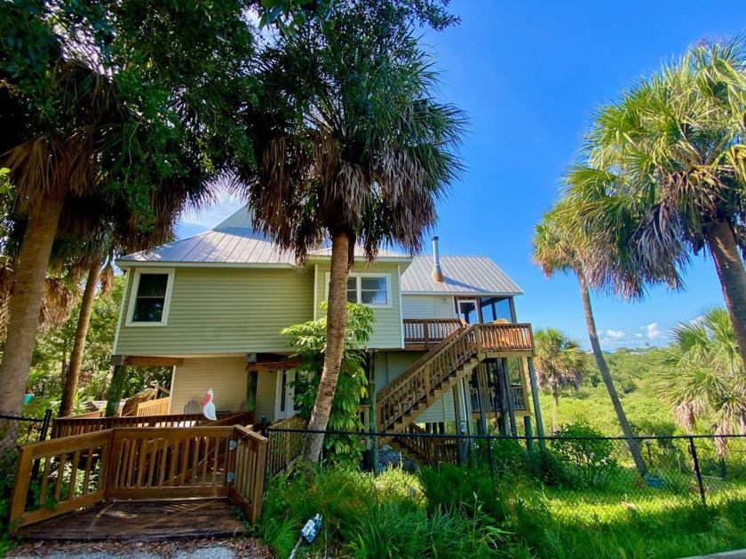 Spectacular bayou views of mangroves and water surround this - Beach Home for sale in Cedar Key, Florida on Beachhouse.com
