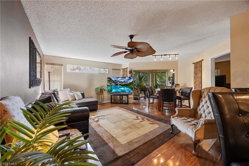 As you step inside, you are greeted by an open-concept living - Beach Condo for sale in Bonita Springs, Florida on Beachhouse.com