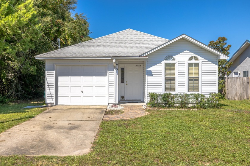 Welcome to 613 Dolphin Drive! This charming 3-bedroom, 2-bath - Beach Home for sale in Panama City Beach, Florida on Beachhouse.com
