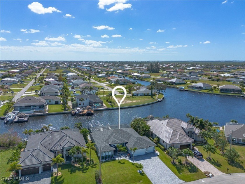 Stunning SOUTHERN EXPOSURE Built in 2022. NO FLOODING HERE! - Beach Home for sale in Cape Coral, Florida on Beachhouse.com