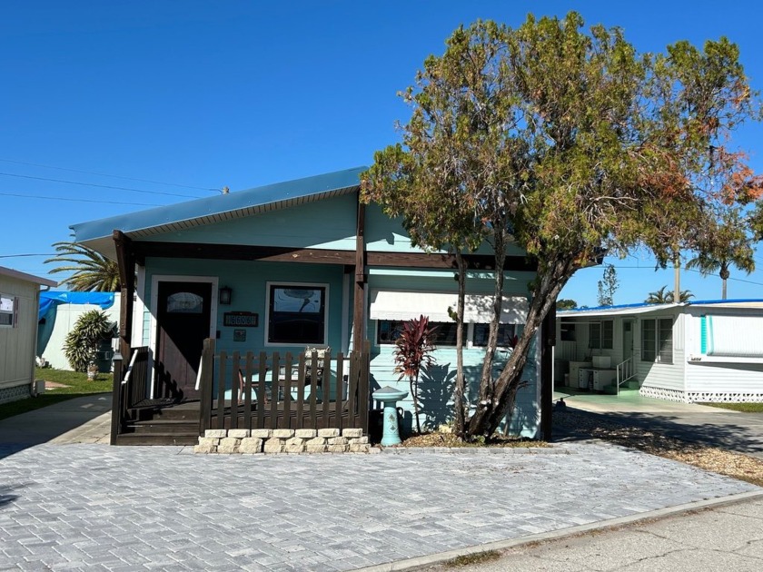 This meticulously renovated residence is situated in the active - Beach Home for sale in Bradenton, Florida on Beachhouse.com