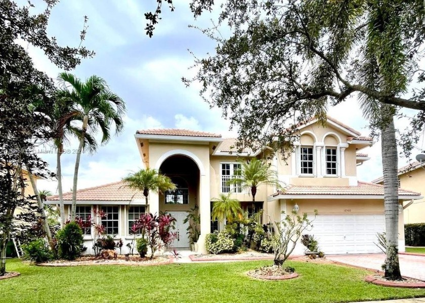 Welcome to this stunning lakefront lilac model home in coveted - Beach Home for sale in Pembroke Pines, Florida on Beachhouse.com