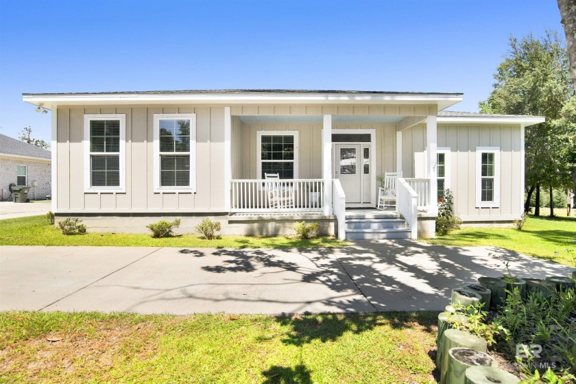 Step into an enchanting coastal sanctuary where modern - Beach Home for sale in Orange Beach, Alabama on Beachhouse.com