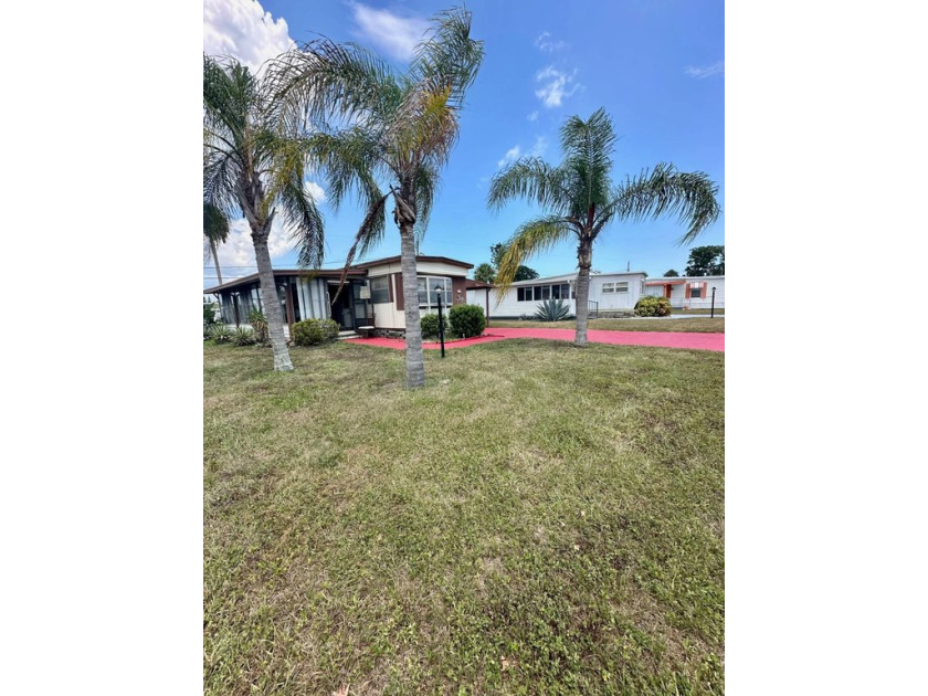 This property features a bright spacious kitchen with a large - Beach Home for sale in South Daytona, Florida on Beachhouse.com