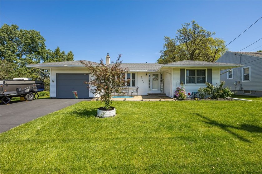 Located in the Town of Gates this beautifully updated ranch home - Beach Home for sale in Rochester, New York on Beachhouse.com
