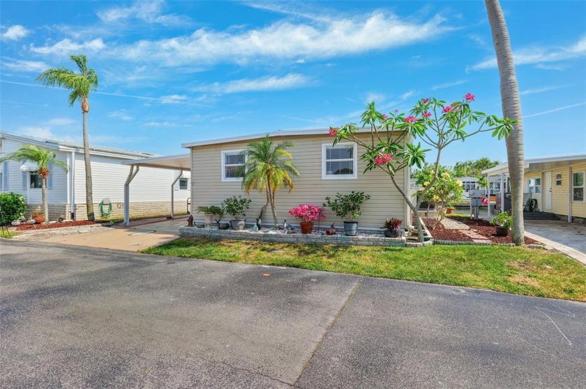 Welcome to your dream home nestled along a picturesque canal - Beach Home for sale in Clearwater, Florida on Beachhouse.com
