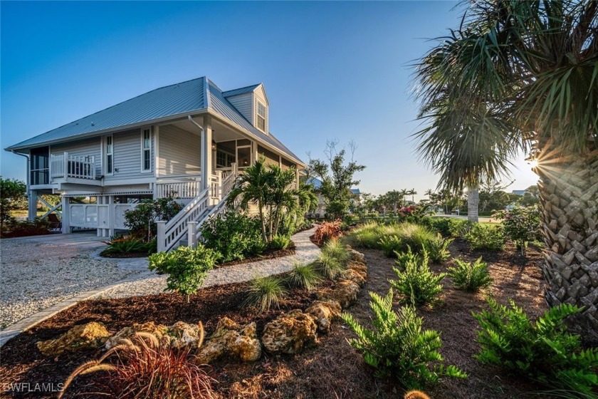 Welcome to a coastal sanctuary that blends timeless - Beach Home for sale in Sanibel, Florida on Beachhouse.com