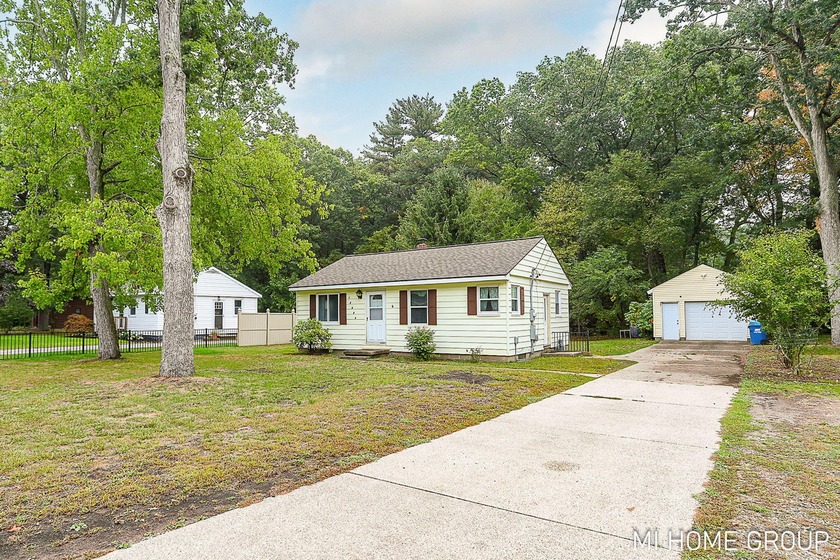 Welcome to this charming 2 bedroom, 1 bath home located in the - Beach Home for sale in Grand Haven, Michigan on Beachhouse.com
