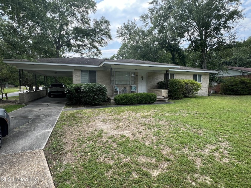 Nestled in the heart of Ocean Springs, Mississippi, this - Beach Home for sale in Ocean Springs, Mississippi on Beachhouse.com