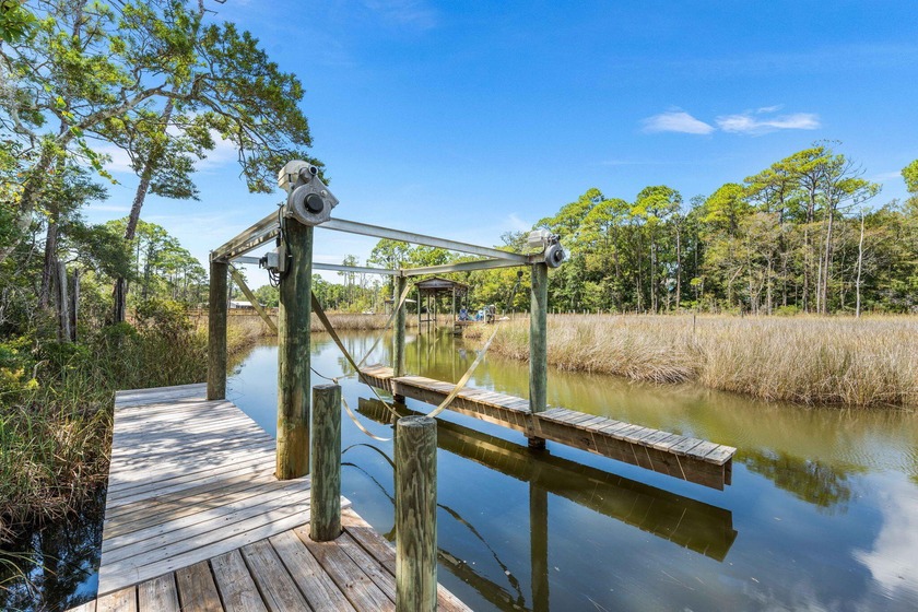 Waterfront living at its best! This 5-bedroom, 3-bath home with - Beach Home for sale in Santa Rosa Beach, Florida on Beachhouse.com