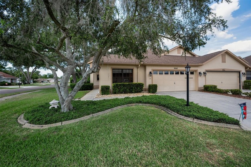 This charming 2-bedroom, 2-bath villa on a desirable corner lot - Beach Home for sale in New Port Richey, Florida on Beachhouse.com
