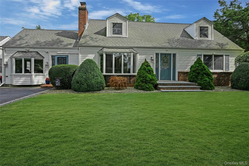 Welcome to this charming cape, a true gem with its private beach - Beach Home for sale in Greenport, New York on Beachhouse.com