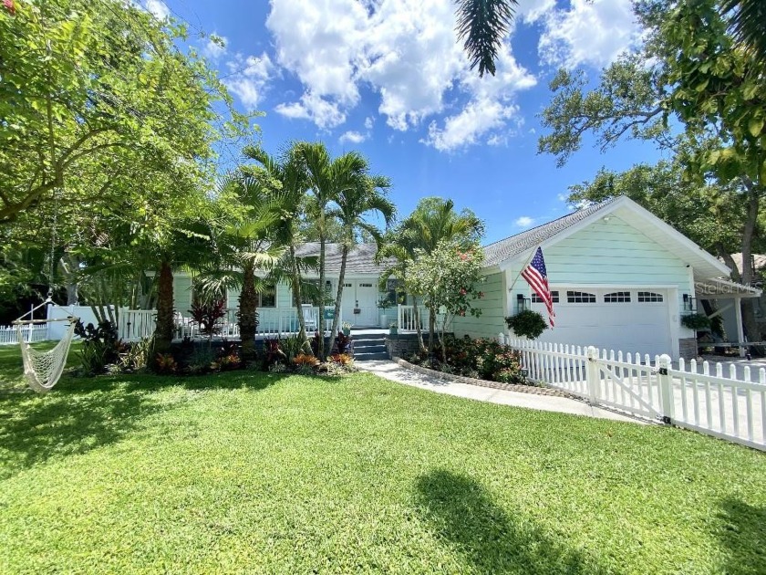 This charming coastal beach cottage has so much character - Beach Home for sale in Seminole, Florida on Beachhouse.com
