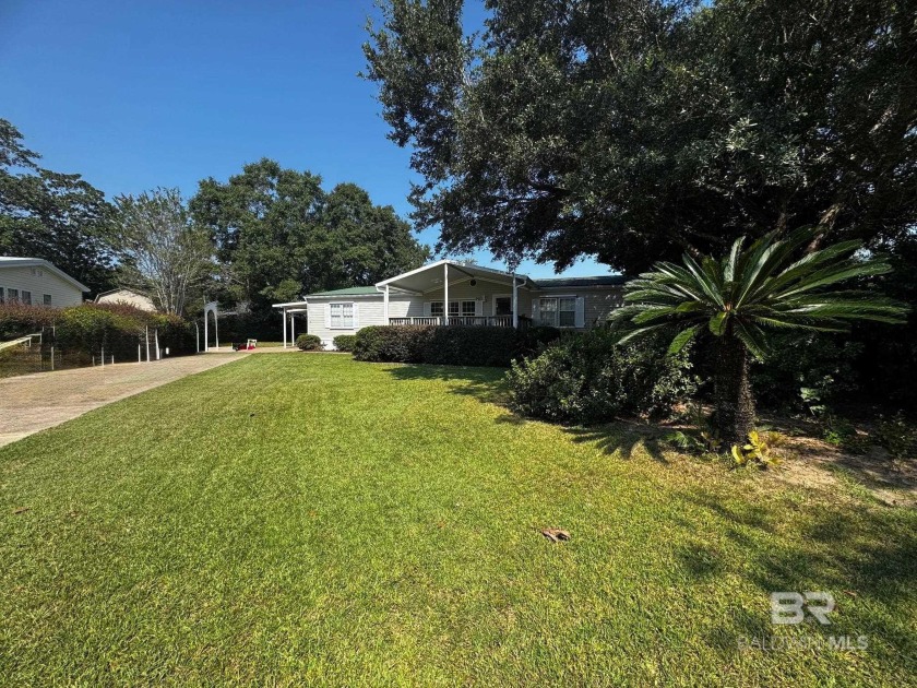 Coastal 3-bedroom, 2-bath home beautifully updated and nestled - Beach Home for sale in Lillian, Alabama on Beachhouse.com