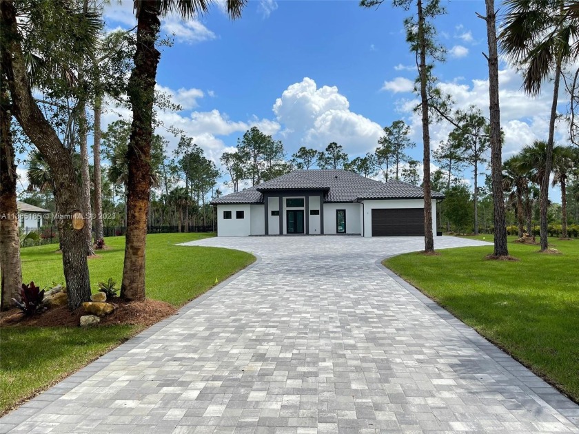 Gorgeous new construction single family home, offering 3830 sq - Beach Home for sale in Naples, Florida on Beachhouse.com