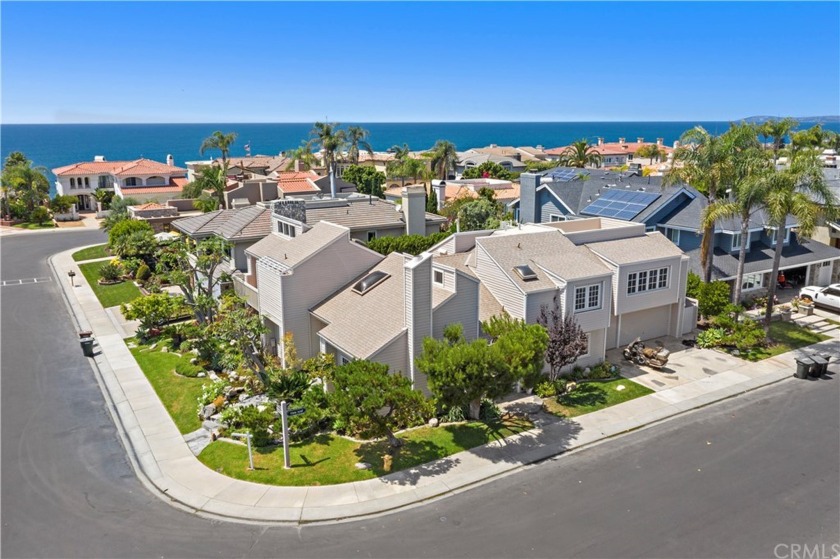 Poised on a premier corner lot in the private, guard gated - Beach Home for sale in San Clemente, California on Beachhouse.com
