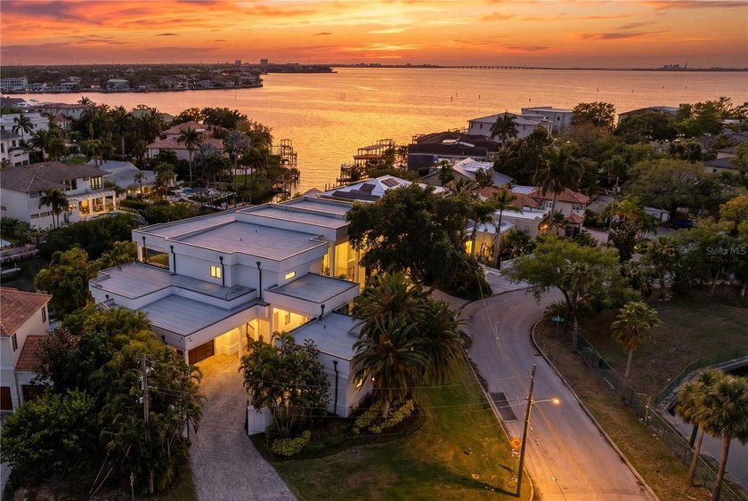 Welcome to this rare, gated waterfront estate situated on a - Beach Home for sale in Tampa, Florida on Beachhouse.com