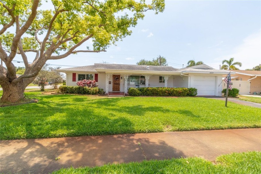 The perfect home awaits. Nestled quiet corner lot, this - Beach Home for sale in St. Petersburg, Florida on Beachhouse.com