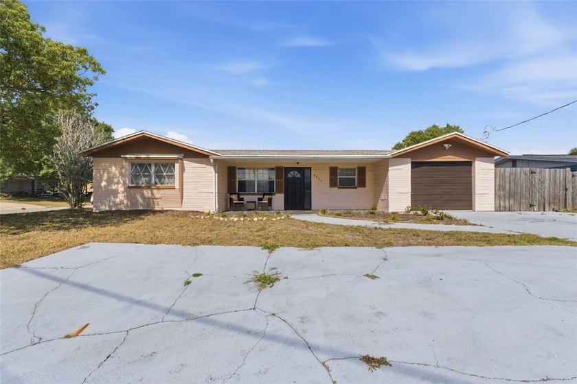 Located in Port Richey, this fully furnished pool home offers a - Beach Home for sale in Port Richey, Florida on Beachhouse.com