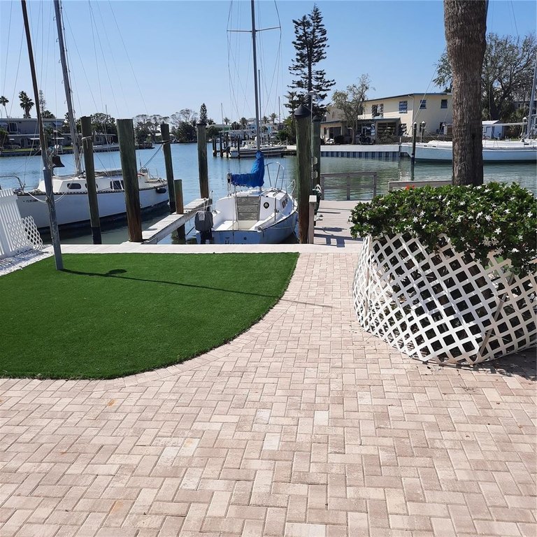 This property is being sold for the lot, dock, and newer seawall - Beach Home for sale in Madeira Beach, Florida on Beachhouse.com
