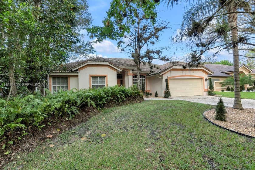 Come home to your lovely lake-front paradise in highly - Beach Home for sale in Lauderhill, Florida on Beachhouse.com