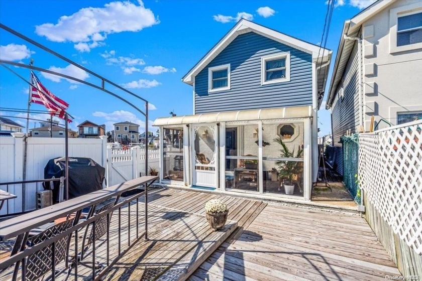 This charming 4-bedroom, 1.5-bath waterfront home offers serene - Beach Home for sale in New York, New York on Beachhouse.com