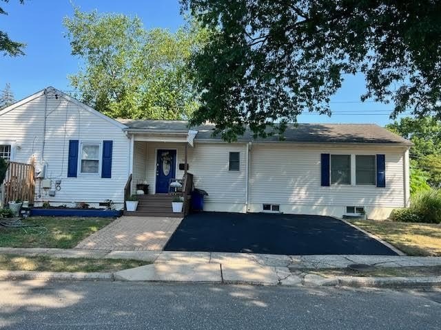 This Expanded Ranch Style Home Sits on and Faces Laurel Court on - Beach Home for sale in Northport, New York on Beachhouse.com