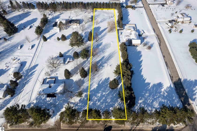This 1.13-acre parcel offers an excellent opportunity to build - Beach Lot for sale in Traverse City, Michigan on Beachhouse.com