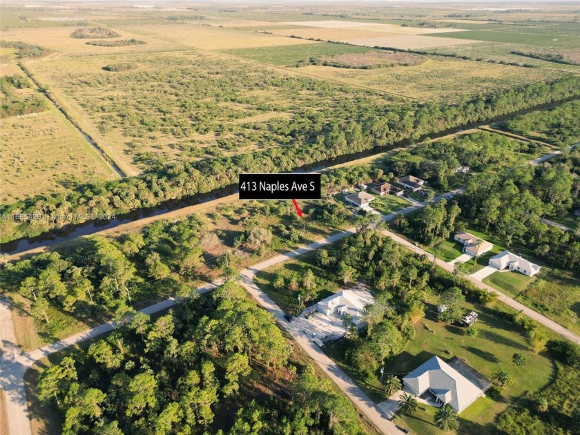 FABULOUS LOT IN A GOOD SECTION ON A WIDE CANAL, EXTRA LAND SPACE - Beach Lot for sale in Lehigh Acres, Florida on Beachhouse.com