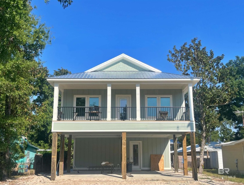 NEAR COMPLETION New Construction located on a less-traveled - Beach Home for sale in Orange Beach, Alabama on Beachhouse.com