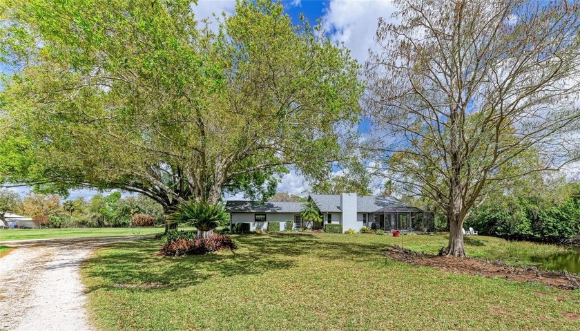 Welcome to your country oasis in town -- a beautifully updated - Beach Home for sale in Bradenton, Florida on Beachhouse.com