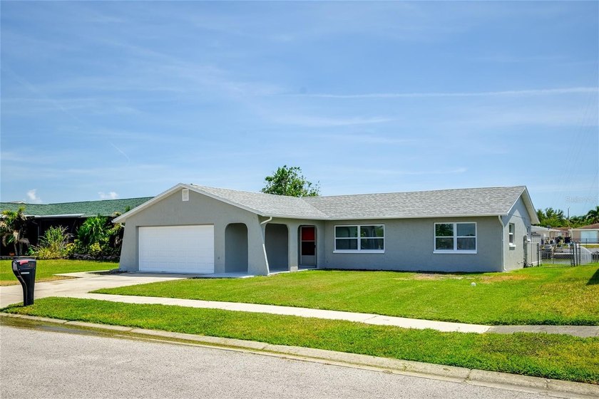 Welcome to 3132 Jackson St in Holiday, Florida--where modern - Beach Home for sale in Holiday, Florida on Beachhouse.com