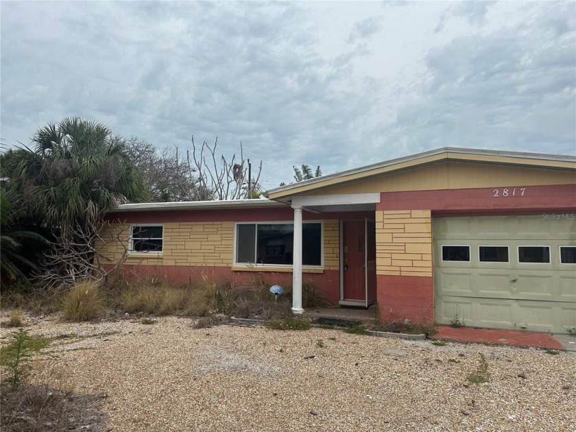 This 2-bedroom, 1.5-bathroom fixer-upper is located in the - Beach Home for sale in Gulfport, Florida on Beachhouse.com