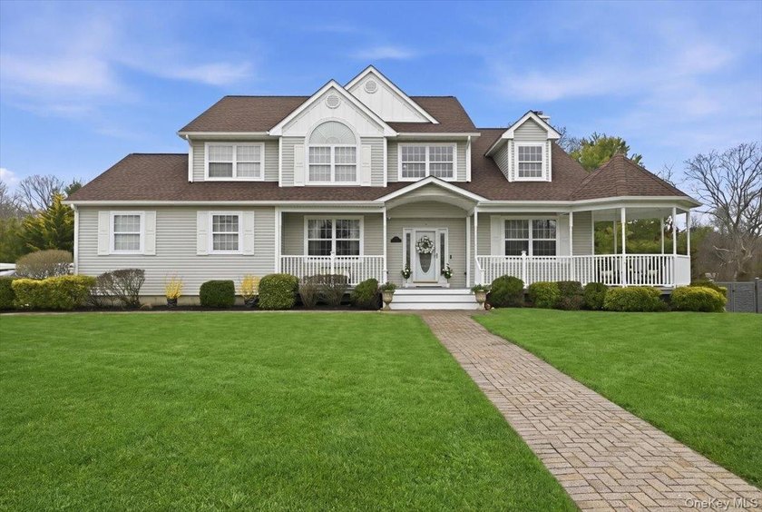 Step inside this stately 4 Bedroom, 5 Bathroom Colonial style - Beach Home for sale in East Patchogue, New York on Beachhouse.com