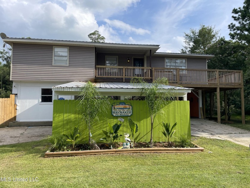 Welcome to your dream waterfront retreat! This beautifully - Beach Home for sale in Bay Saint Louis, Mississippi on Beachhouse.com